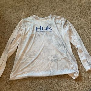 White and gray camo Huk fishing shirt.